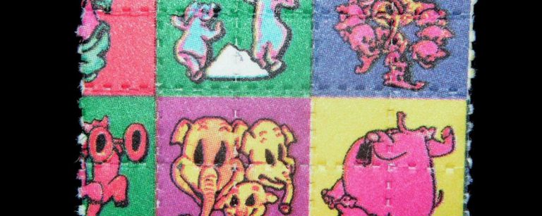 1024px-pink_elephants_on_parade_blotter_lsd_dumbo