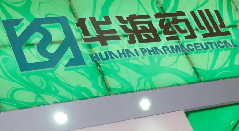 Logo of drug manufacturer Zhejiang Huahai Pharmaceutical Co Ltd is seen at a pharmaceutical products fair in Shanghai