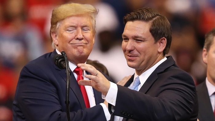 Donald Trump y Ron DeSantis.